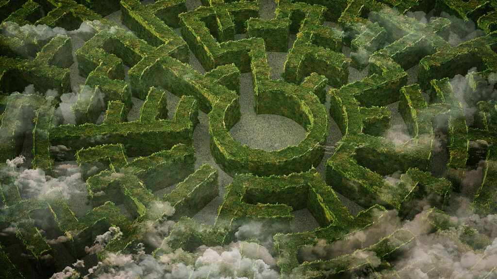 a labyrinth or maze of hedges with wisps of clouds